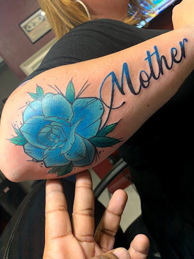 Find best friend tattoo ideas for guys for your next unique tattoo in Cape Coral at UNRIVALED INK