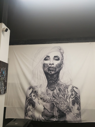 Explore back tattoo ideas for females, creative tattoo ideas in Utica, available at Watchtower Tattoo Company