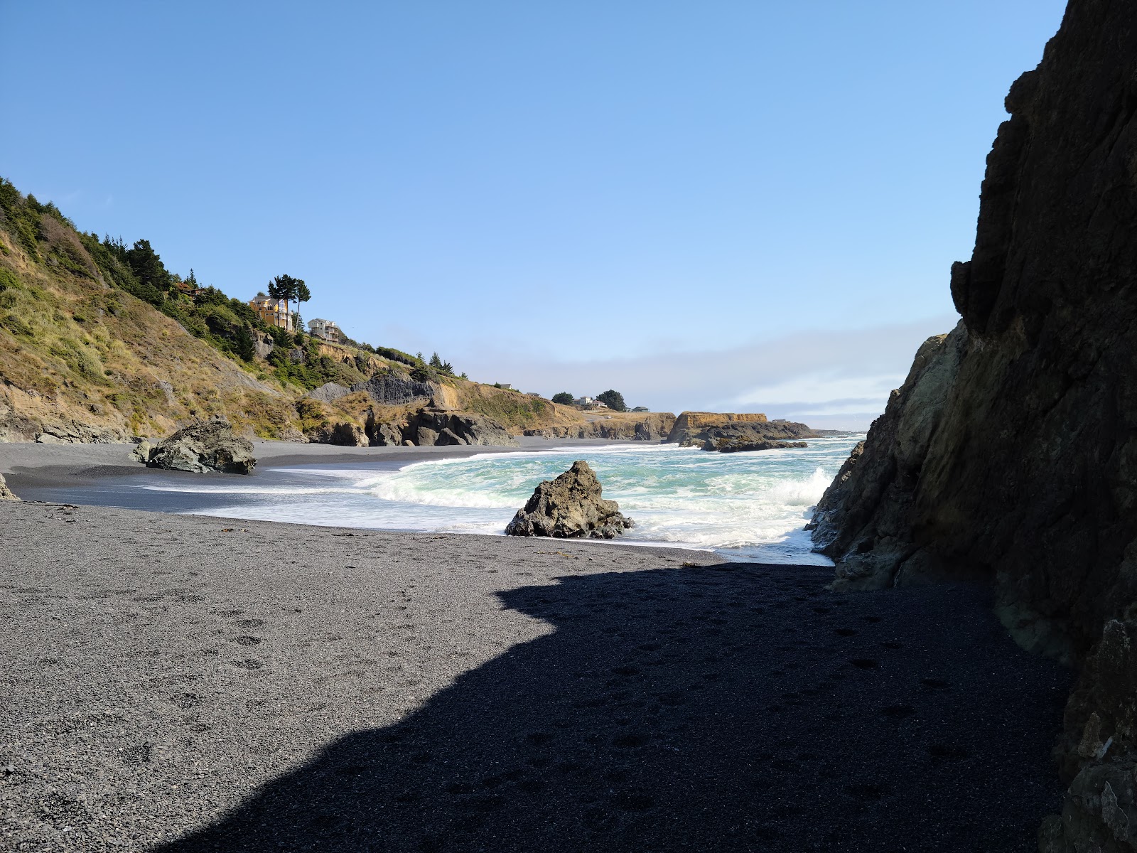 Photo of Black Sands Beach surrounded by mountains