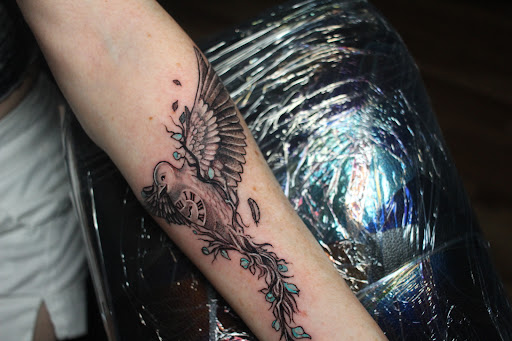 Explore hood neck tattoo ideas, creative tattoo ideas in Homosassa, available at Citrus Tattoos