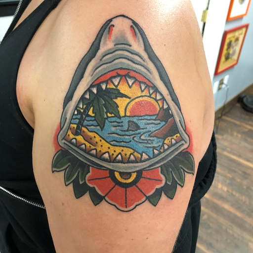 Explore bird cage tattoo ideas, creative tattoo ideas in Delmar, available at Resolute Tattoo