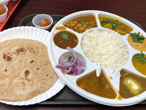 Grocery Store «INDU INDIAN GROCERY STORE (INDU CONVENIENT STORE)», reviews and photos, 4925 W Market St #1104, Greensboro, NC 27407, USA