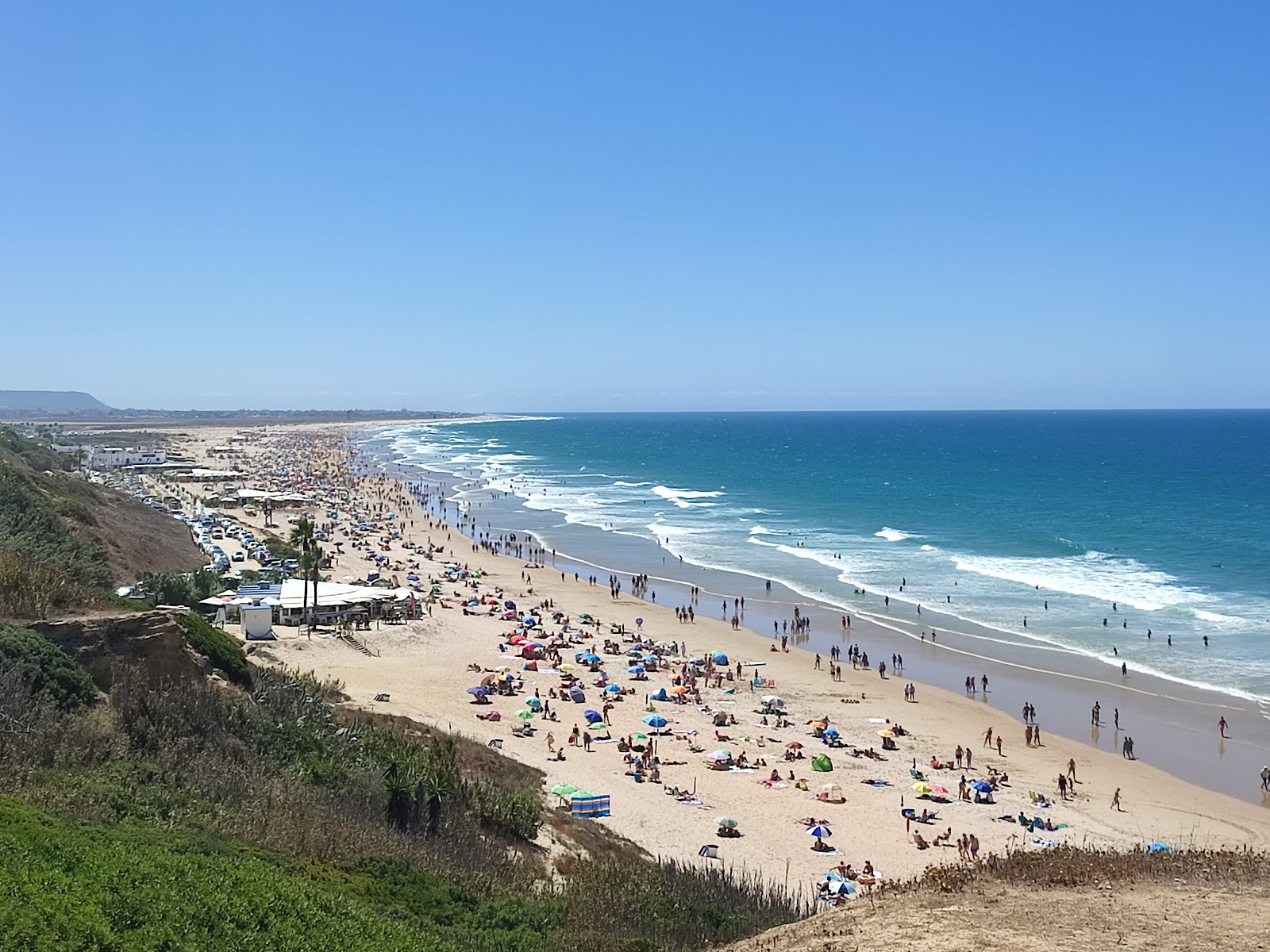 Foto di Playa De Los Bateles con una superficie del sabbia beige