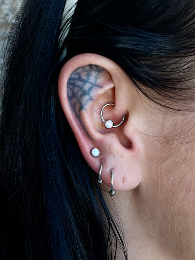 Explore cover up neck tattoo ideas, creative tattoo ideas in San Diego, available at Rose Body Piercing