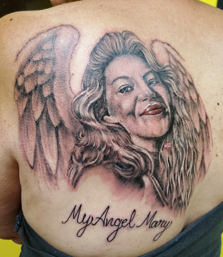 Explore crystal ball tattoo ideas, creative tattoo ideas in Hammonton, available at Exotic Body Works