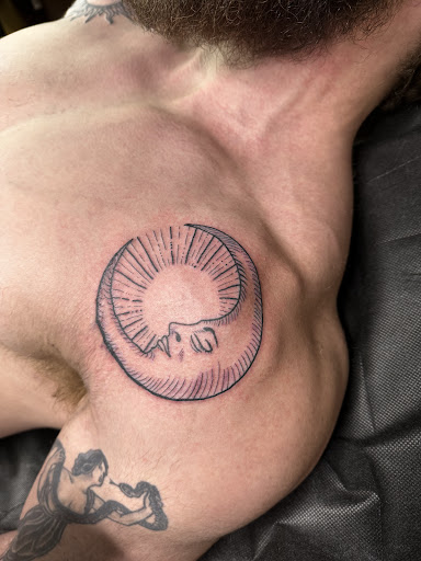 Explore godson tattoo ideas, creative tattoo ideas in Buffalo, available at True Gloom Tattoo Studio