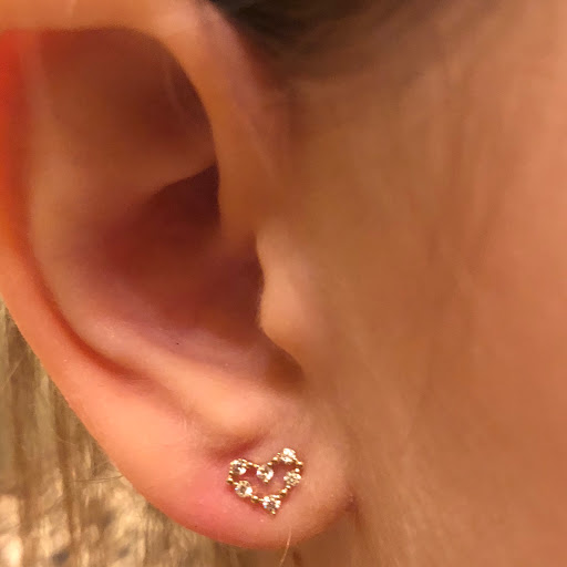Find cute tattoo ideas for black females for your next unique tattoo in New York at Clinical Ear Piercing