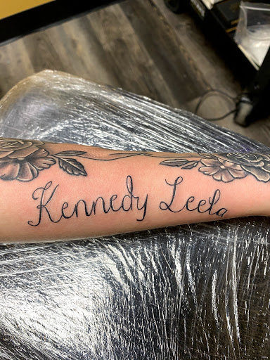 Explore dainty spine tattoo ideas, creative tattoo ideas in Warner Robins, available at Untold Pain Tattoo Studio