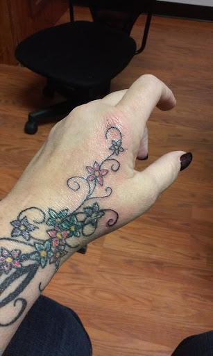 Tattoo Shop «Evil ink tattoo & piercings smokeshop», reviews and photos, 109 Hot Wheels Ln, McMinnville, TN 37110, USA