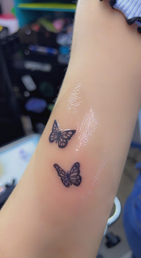 Find garter belt tattoo ideas for your next unique tattoo in Noblesville at Mystic Images Tattoo Co.