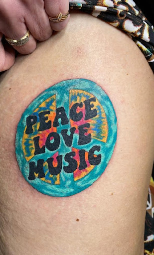 Explore car part tattoo ideas, creative tattoo ideas in Fredonia, available at True Blue Tattoo