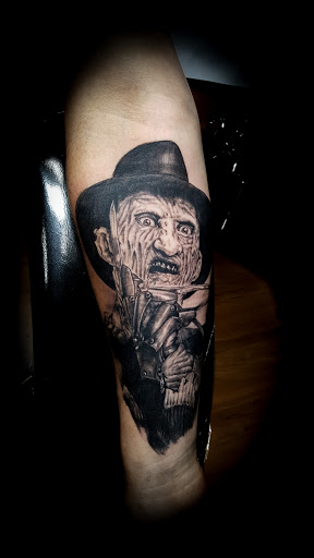 Explore celtic cross tattoo ideas, creative tattoo ideas in Chapel Hill, available at Durham Tattoos