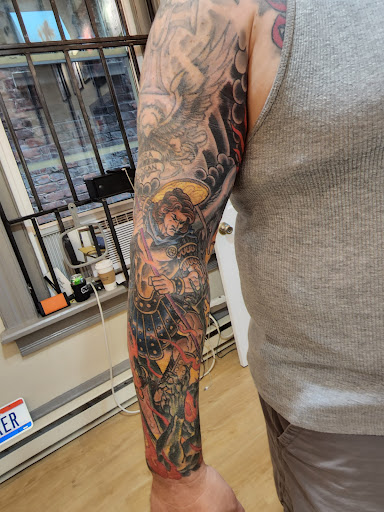 Explore hand and wrist tattoo ideas, creative tattoo ideas in Covington, available at Illuminaut Tattoo