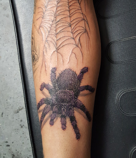 Explore astronaut tattoo ideas, creative tattoo ideas in Wichita, available at Body Canvas Tattooing