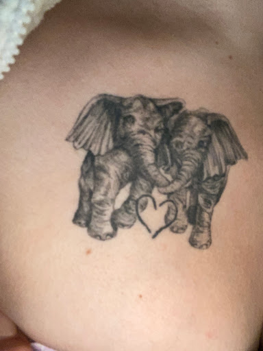 Explore arm tattoo ideas men, creative tattoo ideas in Seymour, available at Sacred Art Tattoo