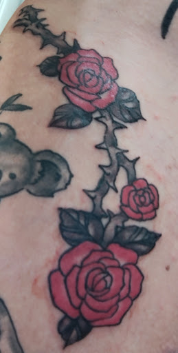 Explore trisomy 21 down syndrome tattoo ideas, creative tattoo ideas in Fresno, available at Skin Decor Tattoo Studio