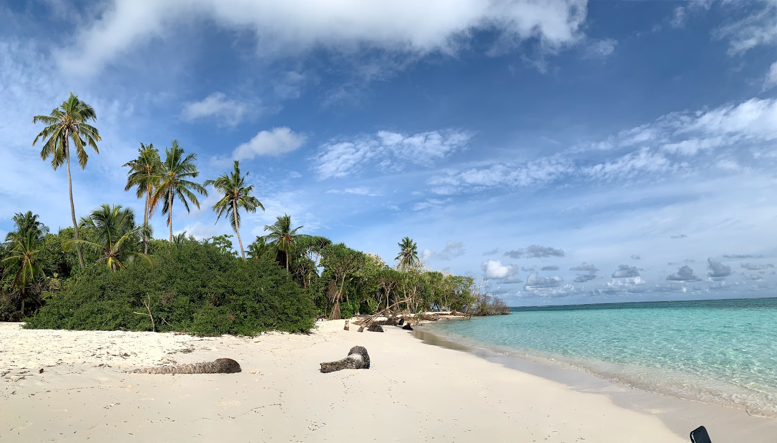 Valokuva Goidhoo Beachista. pinnalla beige iekka:n kanssa