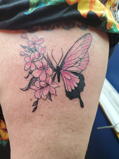 Explore hyena tattoo ideas, creative tattoo ideas in New Albany, available at ThInker Tattoos