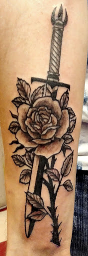 Explore tattoo ideas for photographers, creative tattoo ideas in Peoria, available at Mad Tattoo and Piercing