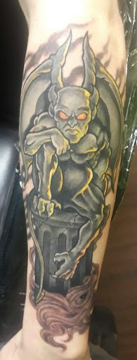 Explore coy fish tattoo ideas, creative tattoo ideas in Clarks Summit, available at Renaissance Body Art Tattoos