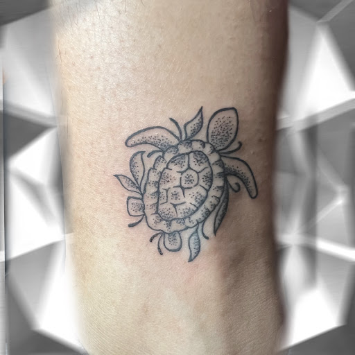 Explore tattoo ideas on hand, creative tattoo ideas in Salisbury, available at Touch of Grey Tattoo & Piercing Studio