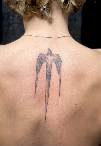 Explore back arm tattoo ideas, creative tattoo ideas in Meridian, available at Creative Pain Tattoo Studio