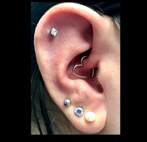 Explore circle tattoo cover up ideas, creative tattoo ideas in Bay Shore, available at Piercings By Dean 95