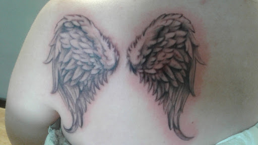 Tattoo Shop «Wild Wonderful Tattoo», reviews and photos, 205 E Main St, Hedgesville, WV 25427, USA