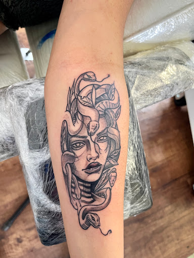 Explore nail tech tattoo ideas, creative tattoo ideas in Rogers, available at Ink Solutions Tattoo