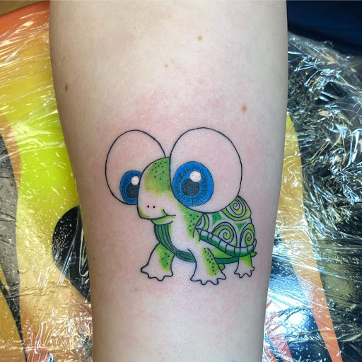 Explore little dragon tattoo ideas, creative tattoo ideas in Dublin, available at The Wicked Clover