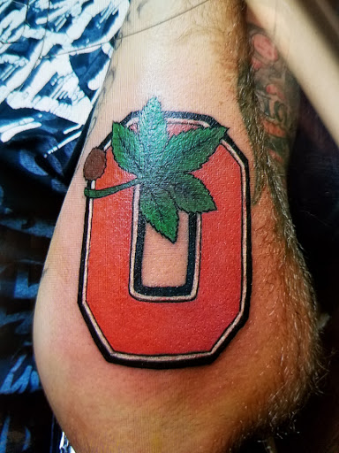 Explore tribal head tattoo ideas, creative tattoo ideas in Cambridge, available at Skinworks Tattoo