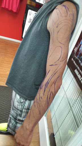 Tattoo Shop «Hot Spot Tattoo & Piercings», reviews and photos, 800 2nd St, Coralville, IA 52241, USA