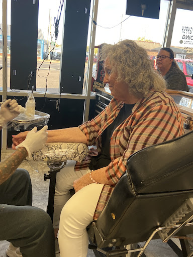 Explore gladiolus tattoo ideas, creative tattoo ideas in Seymour, available at American Gypsy Tattoo Corp.