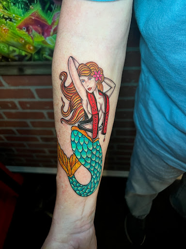 Explore tattoo cover up ideas on hand, creative tattoo ideas in Kissimmee, available at Fallen Heroes Tattoo & Piercing (Florida)