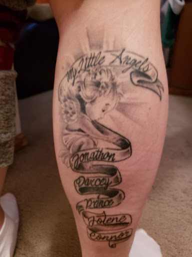 Explore skull and roses tattoo ideas, creative tattoo ideas in Bedford, available at Body Revolution Tattoos & Body Piercings