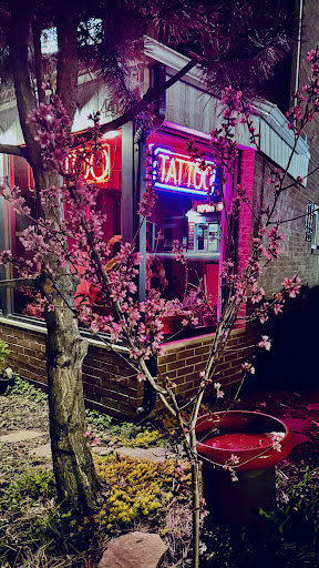 Explore flag tattoo ideas, creative tattoo ideas in Manchester, available at PROPAGANDA Tattoo Studio