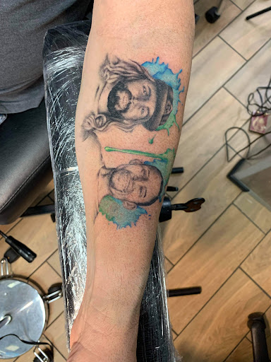 Explore rainbow baby tattoo ideas, creative tattoo ideas in Okeechobee, available at Muck City Tattoos & Piercings