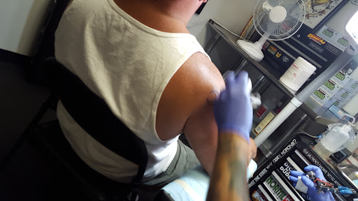 Explore ring finger tattoo cover up ideas for guys, creative tattoo ideas in Summerville, available at Mystic Tiki Tattoo Studio & Gallery