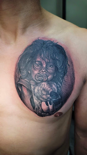 Explore female dragon tattoo ideas, creative tattoo ideas in Trenton, available at Alpha Ink Studio