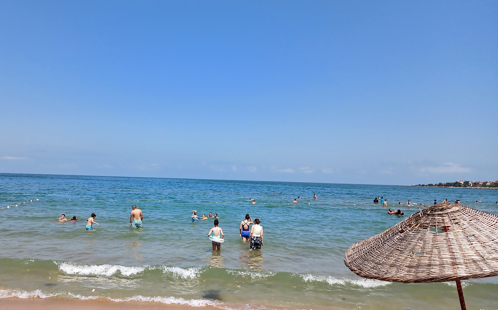 Valokuva Kumcagiz Halk Plajiista. pinnalla turkoosi puhdas vesi:n kanssa