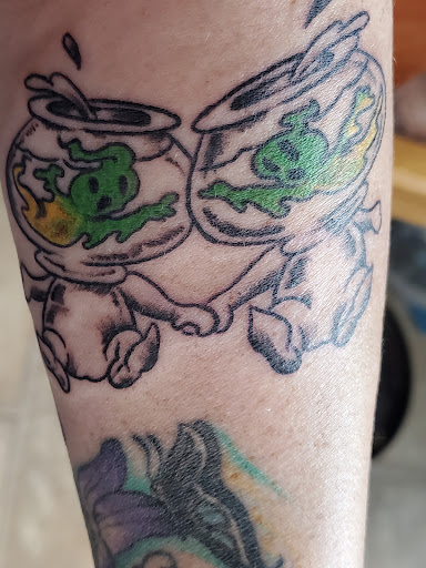 Explore football tattoo ideas, creative tattoo ideas in Butte, available at Spadeball Ink Tattoo