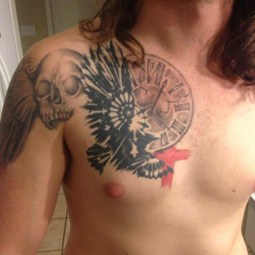 Explore tattoo ideas for neck, creative tattoo ideas in Carthage, available at Ministry of Tattoos Mississippi