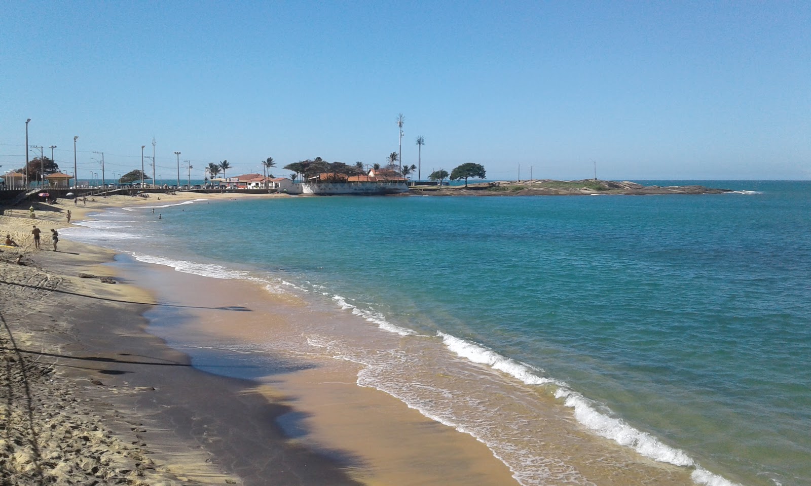 Fotografie cu Plaja Black Sand - locul popular printre cunoscătorii de relaxare