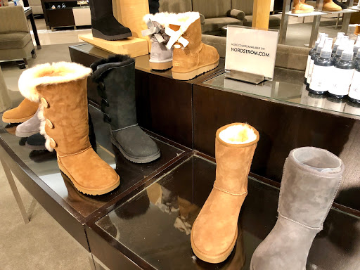 Stores to buy women's beige boots Denver