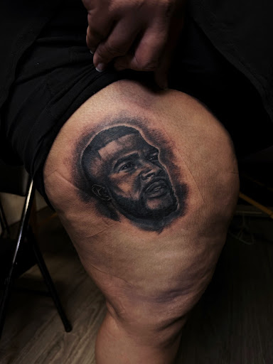 Explore honey badger tattoo ideas, creative tattoo ideas in Watford City, available at Soulful Ink Studios