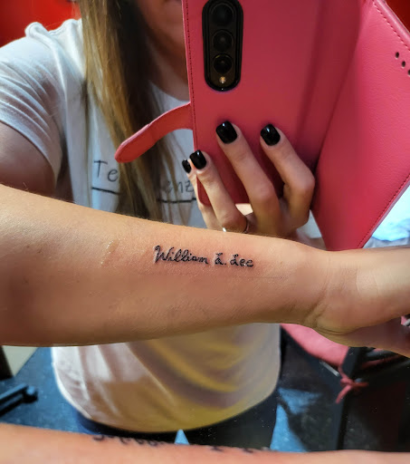 Explore rose and butterfly tattoo ideas, creative tattoo ideas in Valdosta, available at Scarlet Letter Tattoo Studio