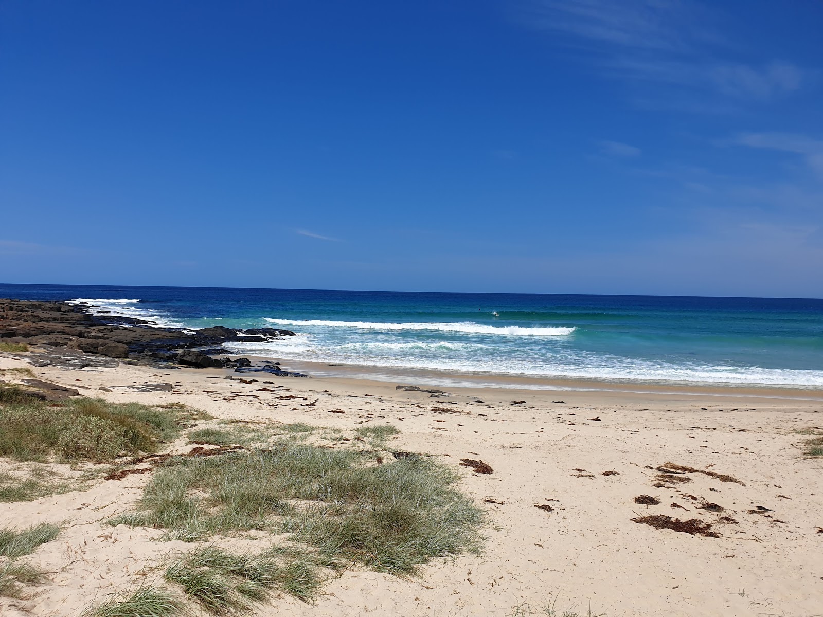 Foto von Bull Pup Beach mit beiger sand Oberfläche