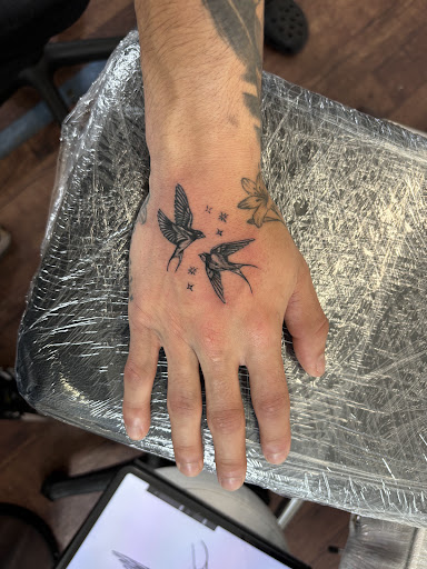 Explore family tattoo ideas for dads, creative tattoo ideas in Rogers, available at Ink Solutions Tattoo