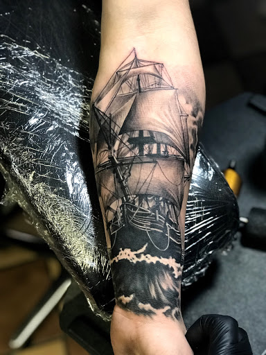 Explore peter pan tattoo ideas, creative tattoo ideas in Atlanta, available at Black Cloud Tattoo and Piercing