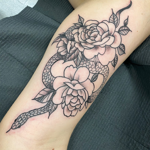 Explore chest cross tattoo ideas, creative tattoo ideas in Buffalo, available at True Gloom Tattoo Studio